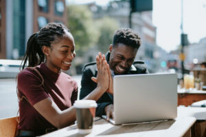 Students giving each other a high five